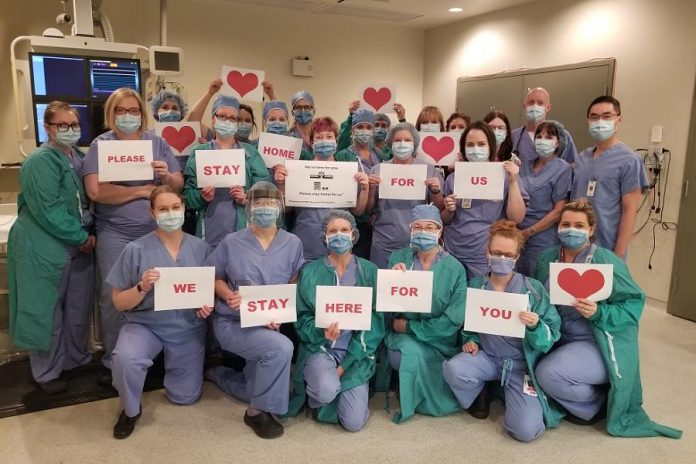 The Cardiac Catheterization Lab team at Peterborough Regional Health Centre (PRHC) with a message for the community. While the PRHC Foundation's efforts to fund vital cardiac and cancer care investments remain critical to PRHC, the Foundation has shifted gears to support the hospital's vital needs to respond to the COVID-19 pandemic. Right now, donors have a special opportunity to double the impact of their gifts to the PRHC Foundation's COVID-19 response fund thanks to a generous matching gift of up to $50,000 from long-time PRHC champions David and Patricia Morton. (Photo: PRHC)