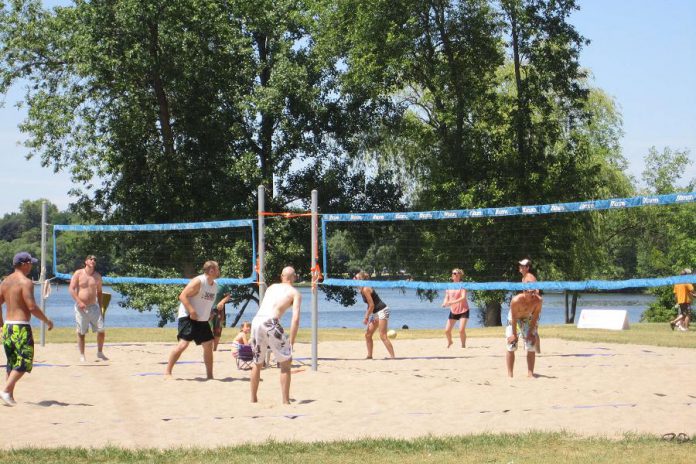 People enjoying volleyball at Beavermead Park in Peterborough's East City in 2015. Although the City of Peterborough is reopening municipal outdoor recreational facilities for limited casual use, all beaches, splsah bads, and wading pools remain closed, and the Ontario government's restriction of gatherings of more than five people remains in place. (Photo: City of Peterborough)