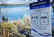 A sign posted by the municipality of Kawartha Lakes advising a boat launch on Washburn Island in Lake Scugog is now open After closing all public boat launches on April 2, 2020, the municipality reopened them on May 14th in time for the Victoria Day long weekend. (Photo: Astrid Hood / @astridhood Instagram)