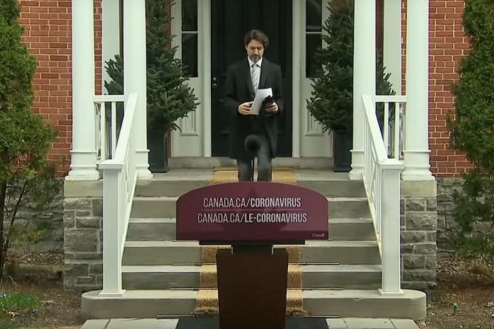 Prime Minister Justin Trudeau emerges from Rideau Cottage in Ottawa on May 8, 2020 to announce an extension past June of the federal government's Canada Emergency Wage Subsidy program for businesses. (Screenshot / CPAC)