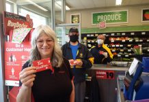 Grocery store workers at Foodland on Hunter Street in Peterborough with Tim Hortons gift cards distributed by the Rotary Club of Peterborough Kawartha to thank the workers for their service. (Photo courtesy of Rotary Club of Peterborough Kawartha)
