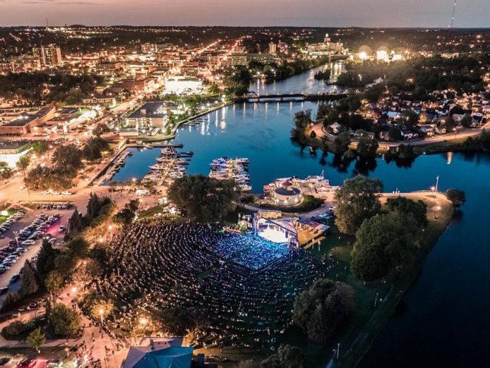 A large crowd at Del Crary Park in downtown Peterborough watches a performance on the Fred Anderson stage at Peterborough Musicfest, Canada's longest-running free-admission summer concert series. For the first time in its 33-year history, the festival has been cancelled due to the COVID-19 pandemic. (Photo: Peterborough Musicfest)