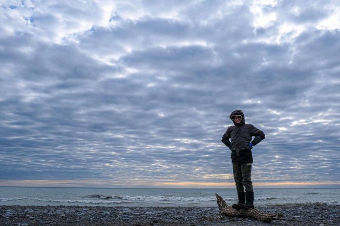 Port Hope artist Lee Higginson's son Charley Jones at West Beach in Port Hope. The Higginson family had been making and leaving public art on the beach when the municipality closed the beach due to the COVID-19 pandemic. Port Hope reopened East Beach and West Beach for pass-through use on May 13, 2020. (Photo courtesy of Lee Higginson)