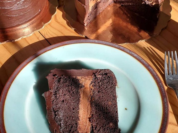 Artist Bill Reddick has spent eight years perfecting the recipe for his popular gluten-free chocolate cake. The cakes are available in Peterborough and he also ships them across Canada. (Photo: Bill Reddick / Instagram)