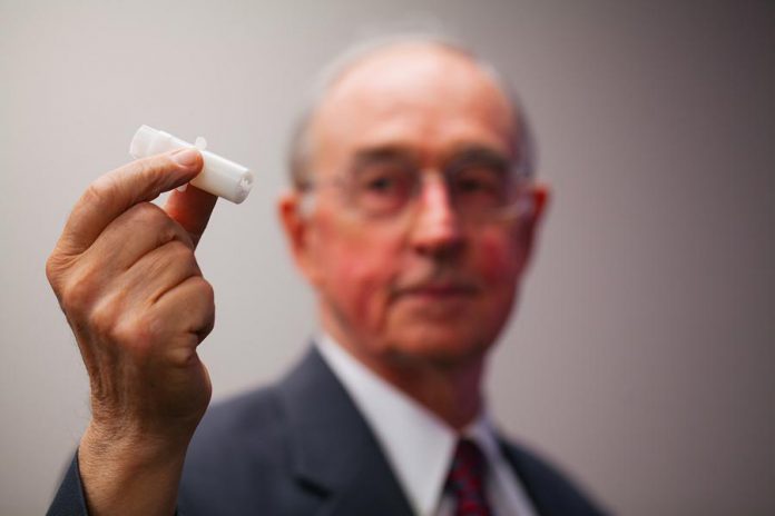 PKA SoftTouch Corp. co-founder and CEO Dick Crawford with the company's patented Micro-Needle, , a device that delivers pain-free injections of medication and vaccines for both people and animals. (Photo: PKA SoftTouch Corp.)