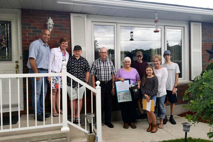 One of Peterborough's two Grandparents of the Year, Darlene Buchanan of Havelock (fifth from right), with her nominator  Ali Buchanan (third from right). Other members of the Buchanan family pictured from left to right: Steve, Marilyn, Bradley, Wayne, Cameron, Tammy, and Devin. Gordon Rosborough of Selwyn Township (not pictured) was also named Grandparent of the Year. (Photo courtesy of Community Care Peterborough)