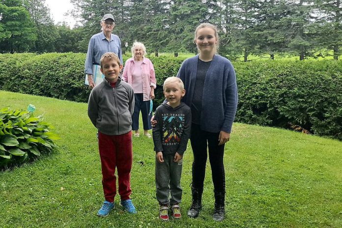 One of Peterborough's two Grandparents of the Year, Gordon Rosborough of Selwyn Township (pictured rear left with his wife Doris) and his nominator Natalie Grace Garbutt (front right) with siblings Issac and Ethan. Darlene Buchanan of Havelock (not pictured) was also named Grandparent of the Year. (Photo courtesy of Community Care Peterborough)