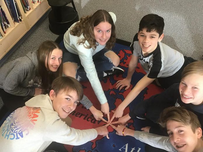 Before schools were closed due to the COVID-19 pandemic, students at Monsignor O'Donaghue point to Peterborough while they explore the significance of the world's fresh water. From left to right: Noah Bowler, Molly Sharman, Shannon Elliott, John Velasquez, Jacob Colocci, and Cooper Cook. (Photo: GreenUP)