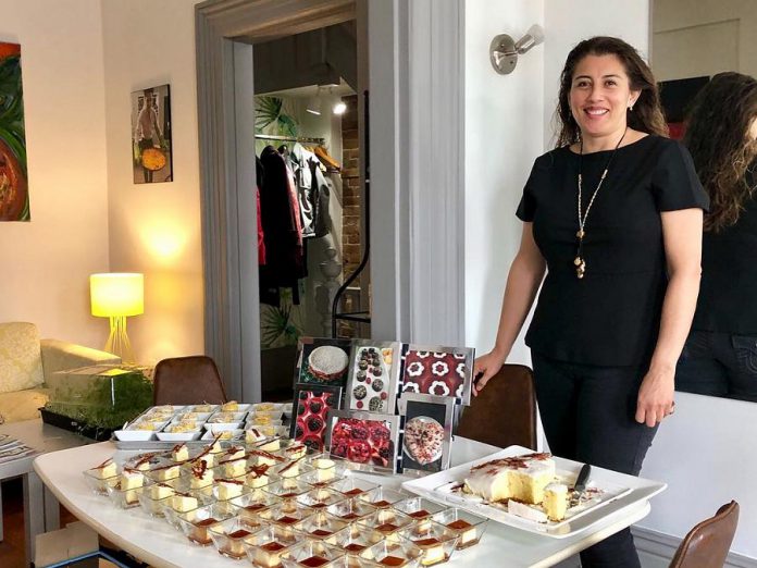 Leticia Cordova, owner of home-based business Maison du Chocolat Gourmet Bakery, with some of her desserts at a tasting at Fresh Dreams in downtown Peterborough in 2018. The Mexican native, who came to Peterborough in 2015 with her family, was a caterer in Mexico City and studied the culinary arts in France. She supplies desserts to Fresh Dreams and La Hacienda Mexican Restaurant as well as to customers across the Peterborough region. Here she displays her caramel flan, corn cake, and lime pound cake with lime icing. (Photo courtesy of Leticia Cordova)