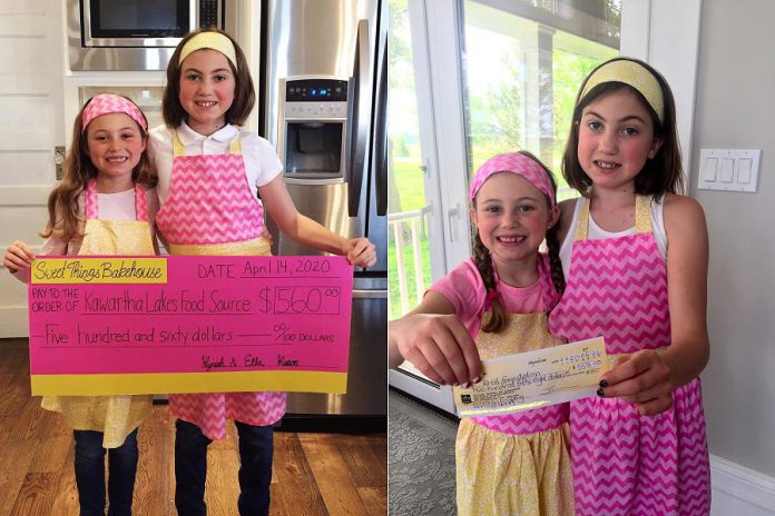 Ella and Myriah Mason with their donations of $560 to Kawartha Lakes Food Source and $558 to Ross Memorial Hospital, which they raised by selling their do-it-yourself sugar cookie kits through their Sweet Things Bakehouse Facebook page. (Photos: Jenn Mason)