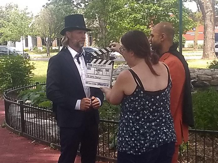 Actors Rick Amsbury and and Steve Kasan with Michelle Foster during the shooting of of "Abra Kadabra" in Lindsay's Victoria Park. Filmmaker Jamie Oxenham his team managed to shoot the entire film in less than seven hours.  (Photo: Sam Tweedle / kawarthaNOW.com)