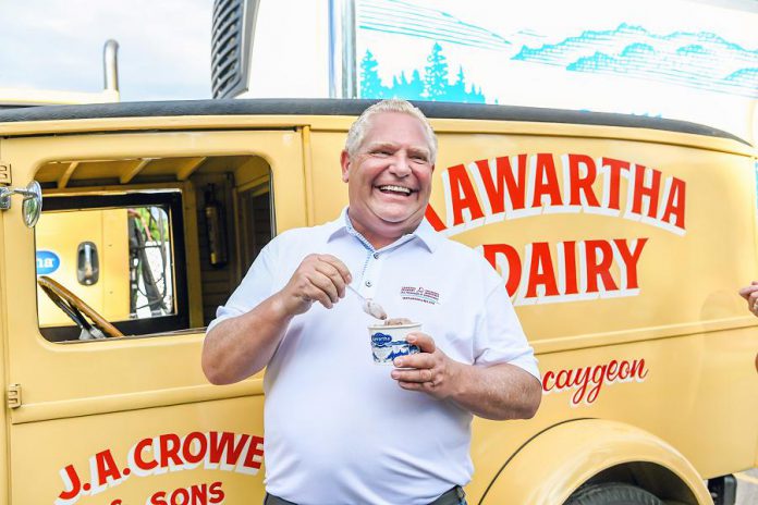 Premier Doug Ford enjoys a taste of Kawartha Dairy's famous ice cream during a visit to the family-owned dairy in Bobcaygeon on July 30, 2020. Early on during the pandemic, the Bobcaygeon community was devastated after 28 residents of Pinecrest Nursing Home passed away from COVID-19. (Photo: Samantha Moss / kawarthaNOW.com)