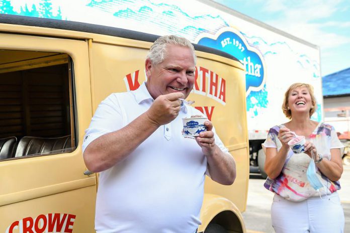 Premier Doug Ford and Haliburton-Kawartha Lakes-Brock MPP Laurie Scott sample ice cream at Kawartha Dairy in Bobcaygeon on July 30, 2020. Earlier in the day, Ford announced that Ontario students would be returning to elementary and secondary schools in September. (Photo: Samantha Moss / kawarthaNOW.com)