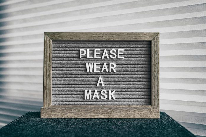 Please wear a mask sign