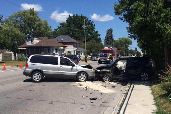 The scene of a head-on collision on Ontario Street in Port Hope on July 17, 2020. The driver of the silver Pontiac van has been charged with operation of a motor vehicle while prohibited and careless driving. (Photo: Port Hope Police Service)