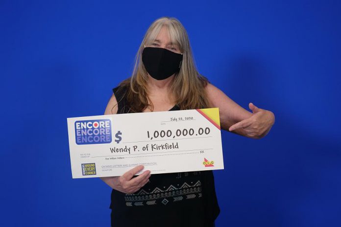 Kirkfield's Wendy Page at the OLG Prize Centre in Toronto picking up her $1 million prize. (OLG-supplied photo)