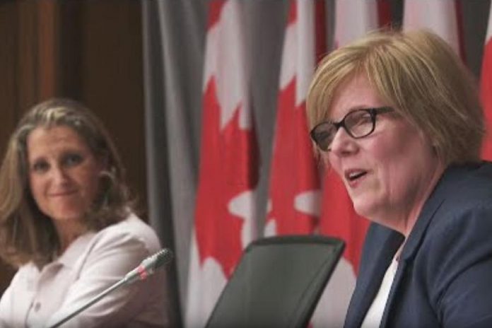 Canada's finance minister Chrystia Freeland and employment minister Carla Qualtrough announcing the extension of the Canada Emergency Response Benefit for another month and new recovery benefits in the employment insurance program on Parliament Hill on August 20, 2020. (CPAC screenshot)