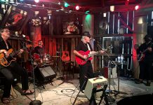 Local band Out On Bail (from left: Richard Simpkins, John Climenhage, Wylie Harold, and Wayne O'Connor) performs one of several numbers at Andy and Linda Tough's barn north of Norwood. The band is one of a number being featured as part of the "Live! At The Barn" series of shows recorded and presented by RMS Events and sponsored by Team vanRahan Century 21. Vidoes of the performances, along with inteviews with the musicians, will coming to YouTube starting August 21, 2020. (Photo: Paul Rellinger / kawarthaNOW.com)