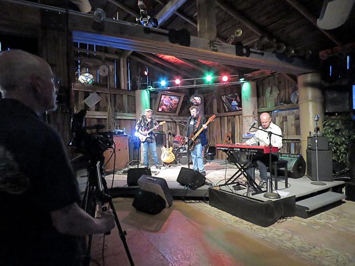 Andy Tough records a performance by local rock-blues-roots band The Fabulous Tonemasters for his new Live! At The Barn music performance video series. You can watch The Fabulous Tonemasters perform on Andy's YouTube channel beginning on August 28, 2020.  Viewers will have an opportunity to donate to the band. (Photo courtesy of Andy Tough)