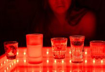 Alcoholic drinks being served in a strip club. (Stock photo)