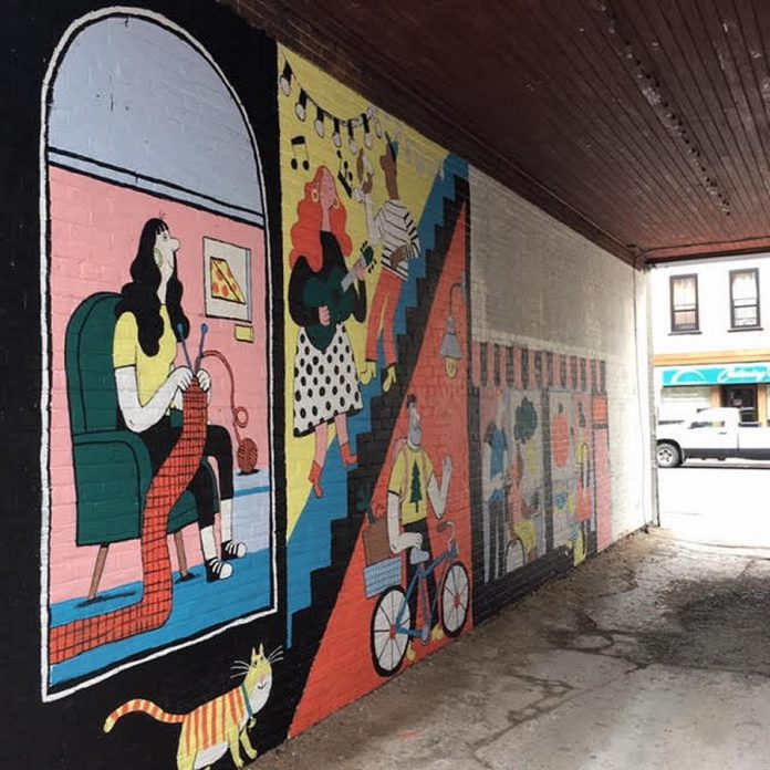 A detail of illustrator Kathryn Durst's mural in progress, to be officially unveiled during the upcoming first Friday on September 4th. (Photo courtesy of First Friday Peterborough)