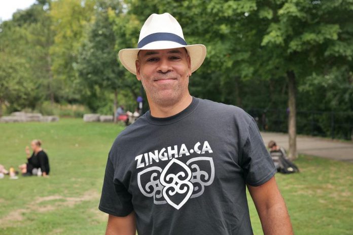 Peterborough musician, actor, and playwright Beau Dixon wearing a Zingha t-shirt, whose logo was designed by artist and former Peterborough resident Stu Adams. Dixon performed with Alana Bridgewater at the launch of the Afrocentric social business, owned and operated by  Cheryl Edwards and Charmaine Magumbe, at the Silver Bean Cafe in Peterborough on September 5, 2020.  (Photo: Branden McCrea)