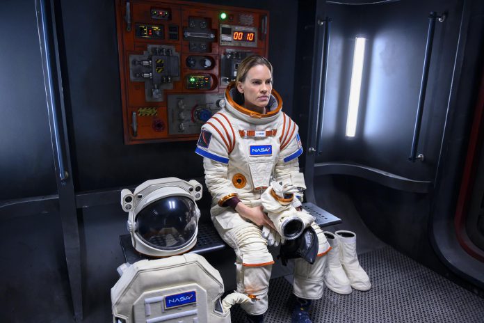 In the Netflix series 'Away', Commander Emma Green (Hilary Swank) leaves behind her husband and daughter to lead an international crew of astronauts on a perilous three-year mission to Mars. Inspired by Port Hope writer Chris Jones' 2014 Esquire article about American astronaut Scott Kelly's year in space, the series debuted on September 4, 2020. Jones also wrote one of the series' 10 episodes. (Photo: Netflix)