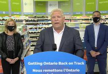 Ontario Premier Doug Ford, accompanied by health minister Christine Elliott and Shoppers Drug Mart president Jeff Leger, at a media conference on September 23, 2020 at Shoppers Drug Mart in Huntsville, where he announced COVID-19 tests for people without symptoms will be available at 60 pharmacies in Ontario. (CPAC screenshot)