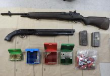 Police seized two weapons and 1,600 rounds of ammunition, along with a quantity of cocaine, from a Peterborough home on September 24, 2020. Two Peterborough residents face gun and drug charges. (Police-supplied photo)