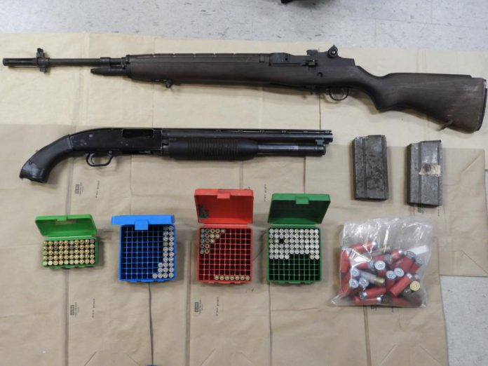 Police seized two weapons and 1,600 rounds of ammunition, along with a quantity of cocaine, from a Peterborough home on September 24, 2020. Two Peterborough residents face gun and drug charges. (Police-supplied photo)