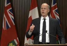 Adalsteinn Brown, dean of the Dalla Lana School of Public Health at the University of Toronto, speaks about updated modelling projections for COVID-19 at a media conference in Queen's Park on October 29, 2020. (CPAC screenshot)