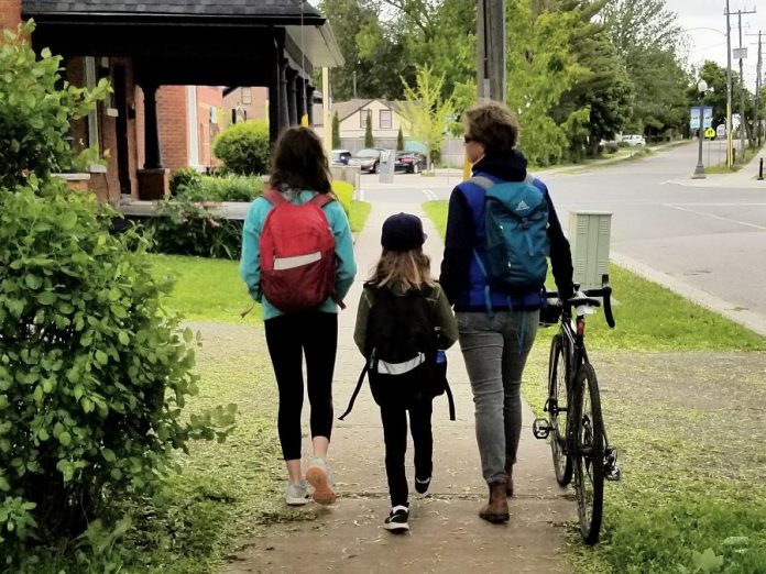 If you can, consider walking with your children to their school before you head off to work. This can be a meaningful time to connect with your kids at the beginning of each day. (Photo: GreenUP)