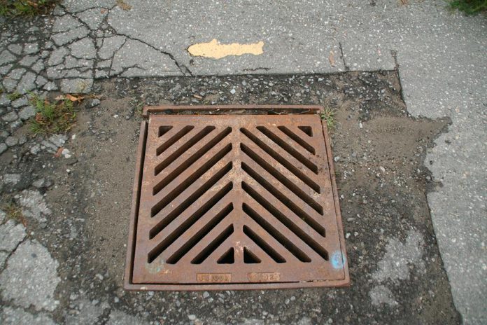 The square-shaped grates on your street carry stormwater and other runoff to the nearest lake, river, or stream. The yellow fish painted near this storm drain is to remind us that whatever goes down the storm drain can impact our waterways. The Yellow Fish Road program raises awareness about keeping our storm sewers clean to protect our waterways.  (Photo: Jenn McCallum)