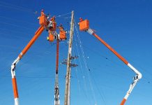 Hydro One workers replacing a hydro pole. (Photo: Hydro One)