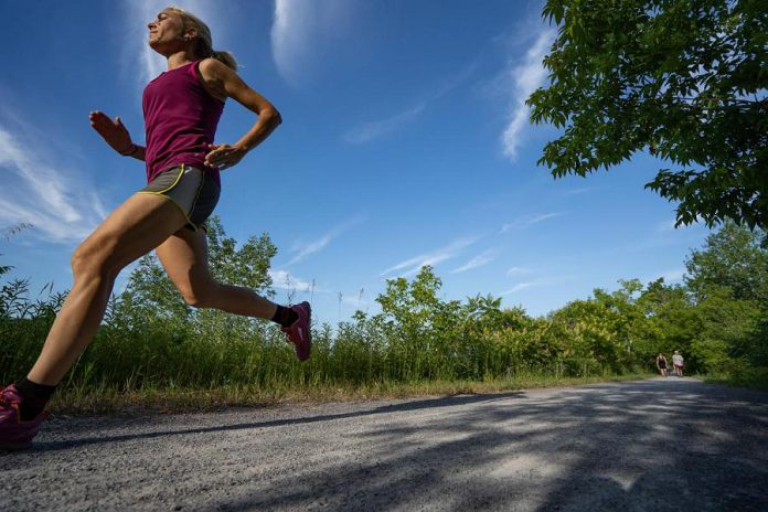 Carlotta James running along the Trans Canada Trail in Peterborough. James co-founded the Monarch Ultra Relay in 2018, along with Peterborough filmmaker Rodney Fuentes, Elmira's Clay Williams, and Toronto's Galen Brown, to raise awareness of the plight of the threatened pollinator. (Photo: Rodney Fuentes)