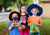 Halloween trick-or-treaters wearing masks during the pandemic. (Stock photo)
