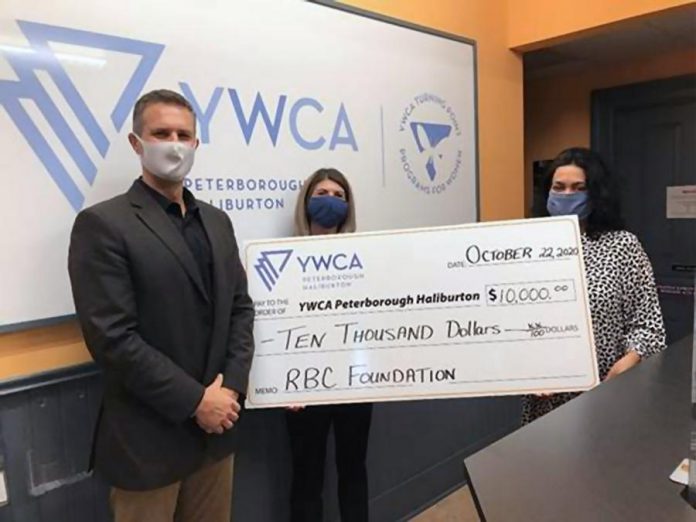 RBC's Scott Mancini and Karalee Murray present a $10,000 donation to Ria Nicholson of YWCA Peterborough Haliburton. (Supplied photo)