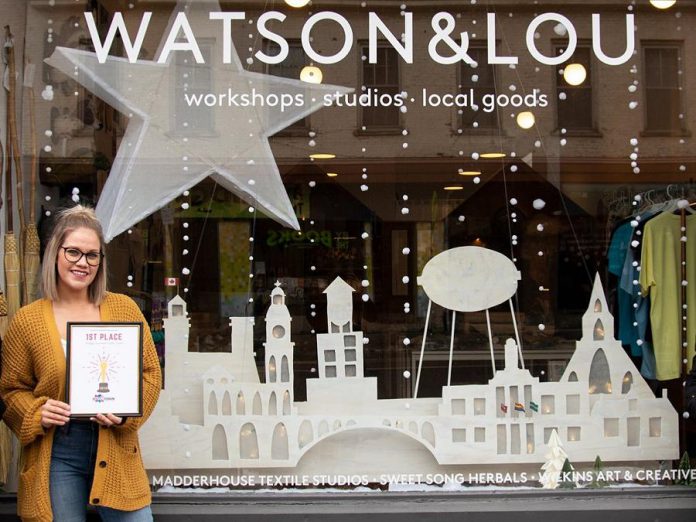Watson & Lou co-owner Erin Watson with the first place award for Downtown Peterborough's 2019 Holiday Decorated Window Contest. The 2020 contest runs from November 19th to December 5th. (Photo courtesy of Peterborough DBIA)