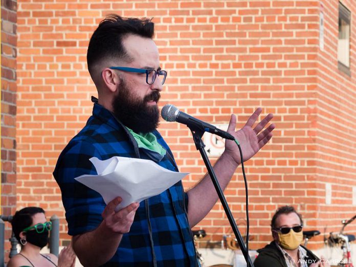 Poet Justin Million, the 2020 Downtown Artist in Residence, performing at "An Afternoon of Spoken Word & Poetry #2" outside The Theatre on King in downtown Peterborough on November 7, 2020. The event was part of Artsweek SHIFT: Downtown, which Million curated, and featured poets and spoken word artists including Jon Hedderwick, Elizabeth Jenkins, Shaun Phua, Nick Taylor, and more. (Photo: Andy Carroll)