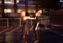 Kate Story and Ryan Kerr perform "Love in the Time of Covid" in the parking lot behind The Theatre On King in downtown Peterborough in early October 2020. The small not-for-profit black-box theatre, which has been closed since the pandemic began, is raising funds to make it through the pandemic with the support of local businesses along with Public Energy Performing Arts. (Photo: Andy Carroll)
