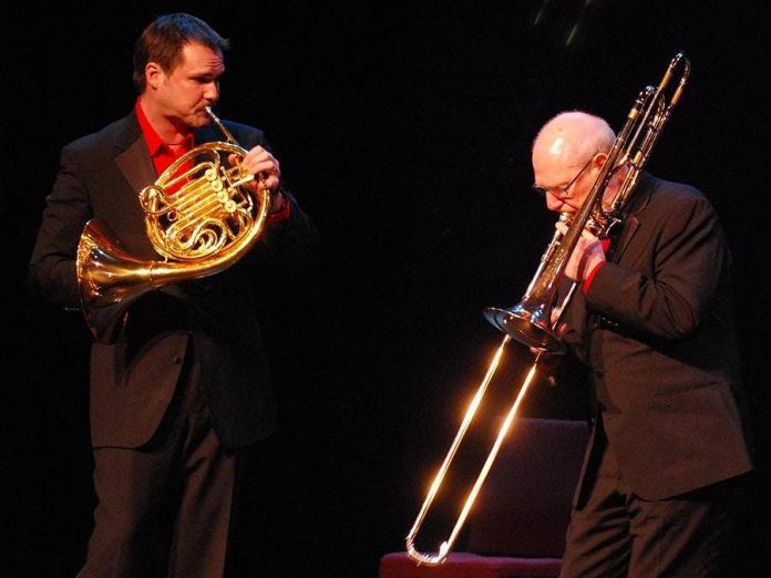 Well before he became PSO music director, Michael Newnham had private lessons on trombone with Gene Watts (right), founder of Canadian Brass, pictured here with Canadian Brass member Jeff Nelsen on French horn performing "Swing that Music" by Louis Armstrong at the Buskirk-Chumley Theater in Bloomington, Indiana in 2010. (Photo:  Allison Tyra)