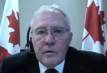 Canada's public safety and emergency preparedness minister Bill Blair speaking virtually at a media conference on December 30, 2020, when the federal government announced all air travellers entering Canada must prove they have had a negative PCR COVID-19 test within 72 hours before arriving in the country. (CPAC screenshot)