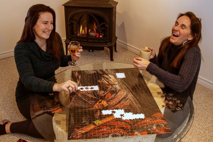 PuzzQuest founder and owner George Gill recently tasked his own family to complete the expert-level 1,000-piece Conformity puzzle to test the degree of difficulty and enjoyment level. (Photo courtesy of PuzzQuest)