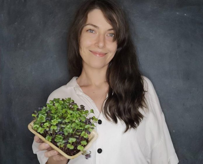 Stephanie Hendren runs Peterborough Microgreens with her partner Daniel Etmanski. They've launched an online store supplying microgreens products from her family-owned, sustainable urban farm in the west end of Peterborough. Hendren was one of the 10 women who took part in the first cohort of the Innovation Cluster's Women Breaking Barriers program. (Photo courtesy of the Innovation Cluster)