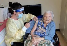 Elizabeth Campbell, a 106-year-old resident at Fairhaven long-term care home in Peterborough, was the first person in the Peterborough area to receive a COVID-19 vaccine. The Moderna vaccine was administered on January 26, 2021 by Lori Rowsell, infection prevention and control practitioner at Fairhaven. (Photo: Peterborough Public Health)