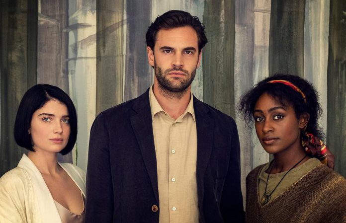Eve Hewson, Tom Bateman, and Simona Brown are in a love triangle in the British psychological thriller Behind Her Eyes, based on the 2017 novel of the same name by Sarah Pinborough. The six-part series premieres on Netflix on February 17, 2021. (Photo: Netflix)