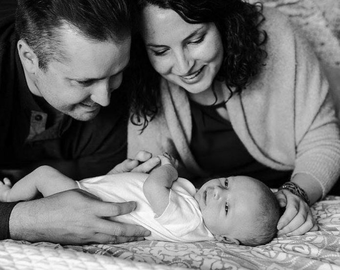 Sarah McDougall Perrin, who founded the PRHC Foundation Mombassadors group in 2018 with her sister Erin Marshall, pictured with her husband Scott and their son Weston. Through the hospital's foundation, the growing group of local mothers raises funds for the neonatal intensive care unit (NICU) at Peterborough Regional Health Centre (PRHC). (Photo by Jen Austin Driver supplied by PRHC Foundation Mombassadors)