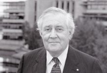 Thomas H.B. Symons in front of the Bata Library at Trent University in Peterborough. The founding president of the university, Professor Symons has passed away at the age of 91. (Photo courtesy of Trent University)