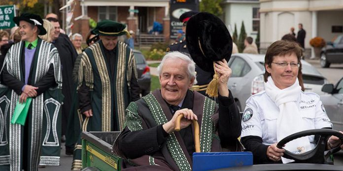 Thomas H.B. Symons in Trent University's 50th anniversary parade procession in 2014.  After his retirement in 1994,Professor Symons remained an active member of the university community as well within Peterborough and beyond.  (Photo courtesy of Trent University)