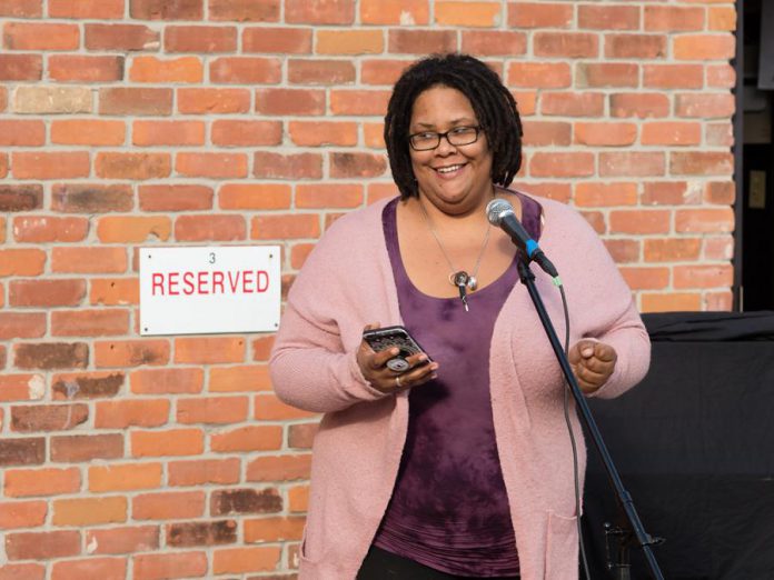 Poet Elizabeth Jenkins at "An Afternoon of Spoken Word & Poetry #1" on October 24, 2020 in the parking lot of The Theatre on King in downtown Peterborough. The event was part of Artsweek SHIFT: Downtown, curated by poet Justin Million. One component of Artsweek SHIFT<sup>2</sup> will provide funding of up to $1,500 to support artists' creative development and to sustain their art practice. Projects can include public performance but are not required to. (Photo: Andy Carroll)